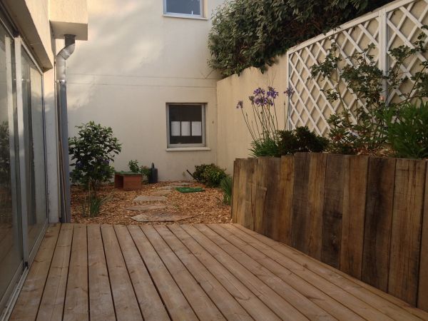 Muret bois jardin au Pila sur mer